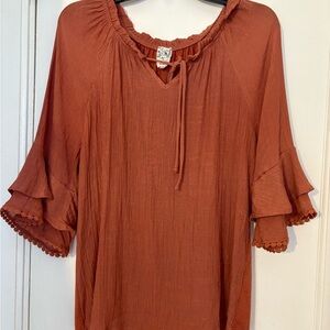 NAIF Terracotta Ruffle Sleeve Blouse
